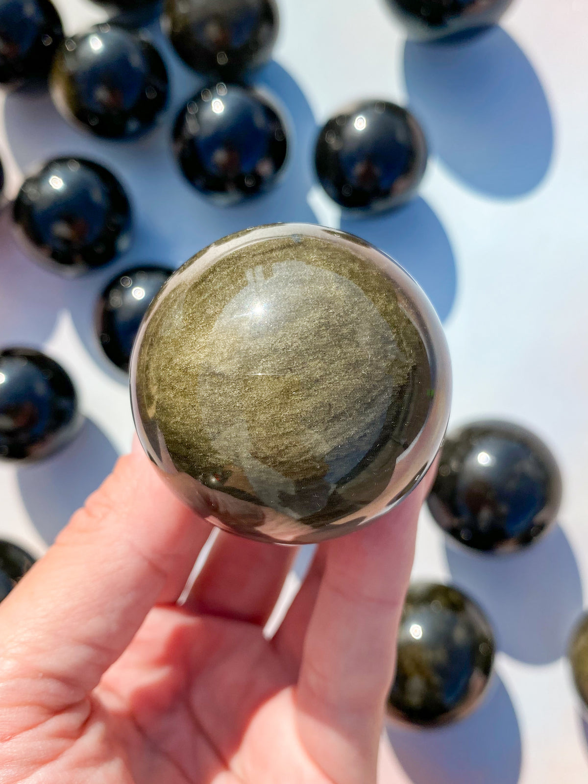 Guld Obsidianboll