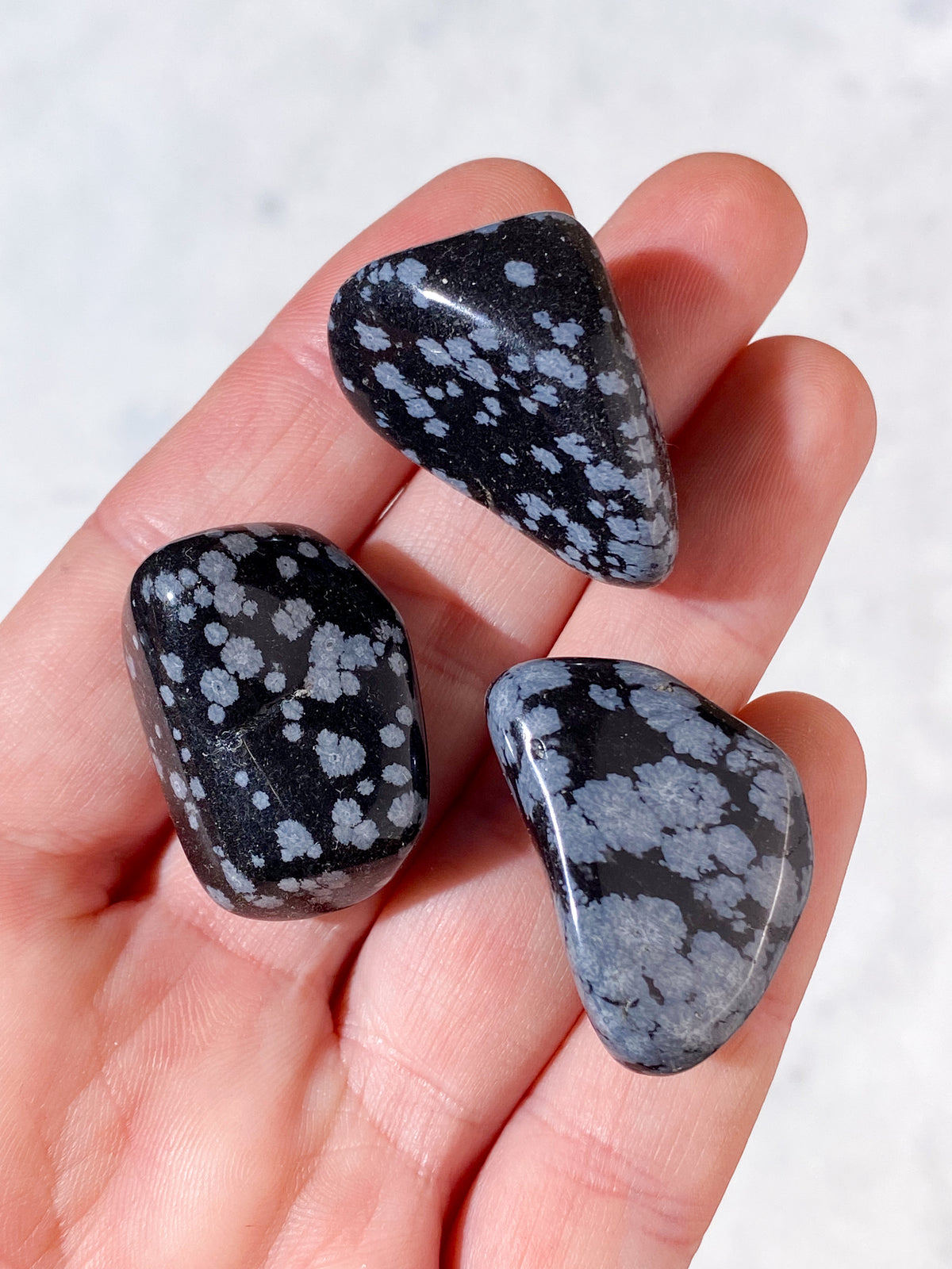 Snöflingor obsidian polerad