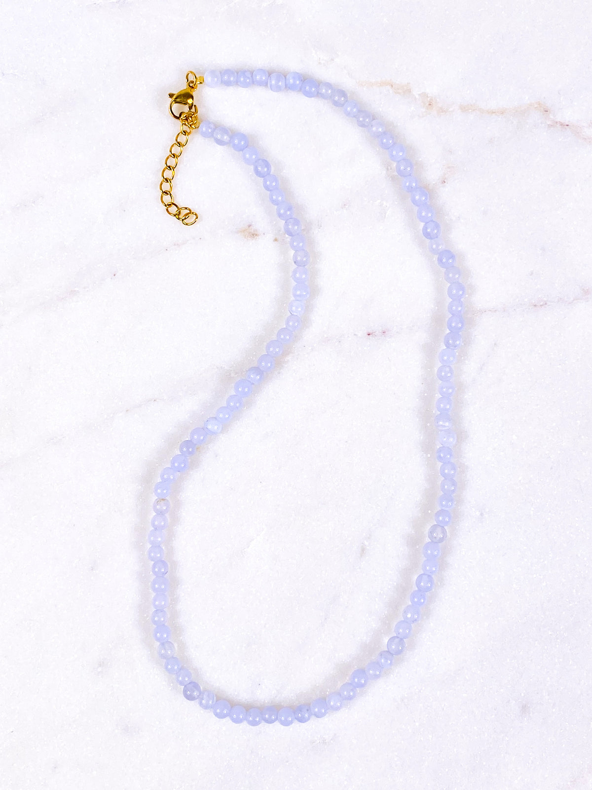 Halsband i spetsagat