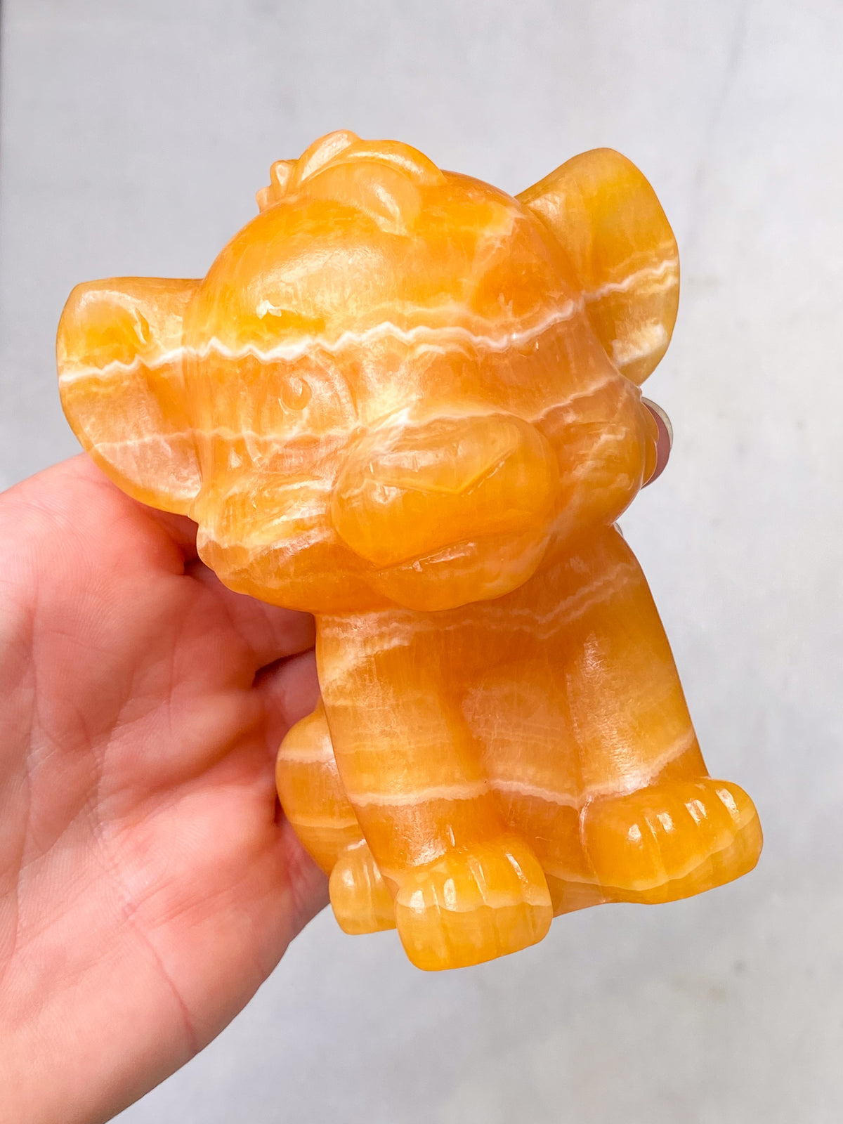 Orange kalcitpumpa med band
