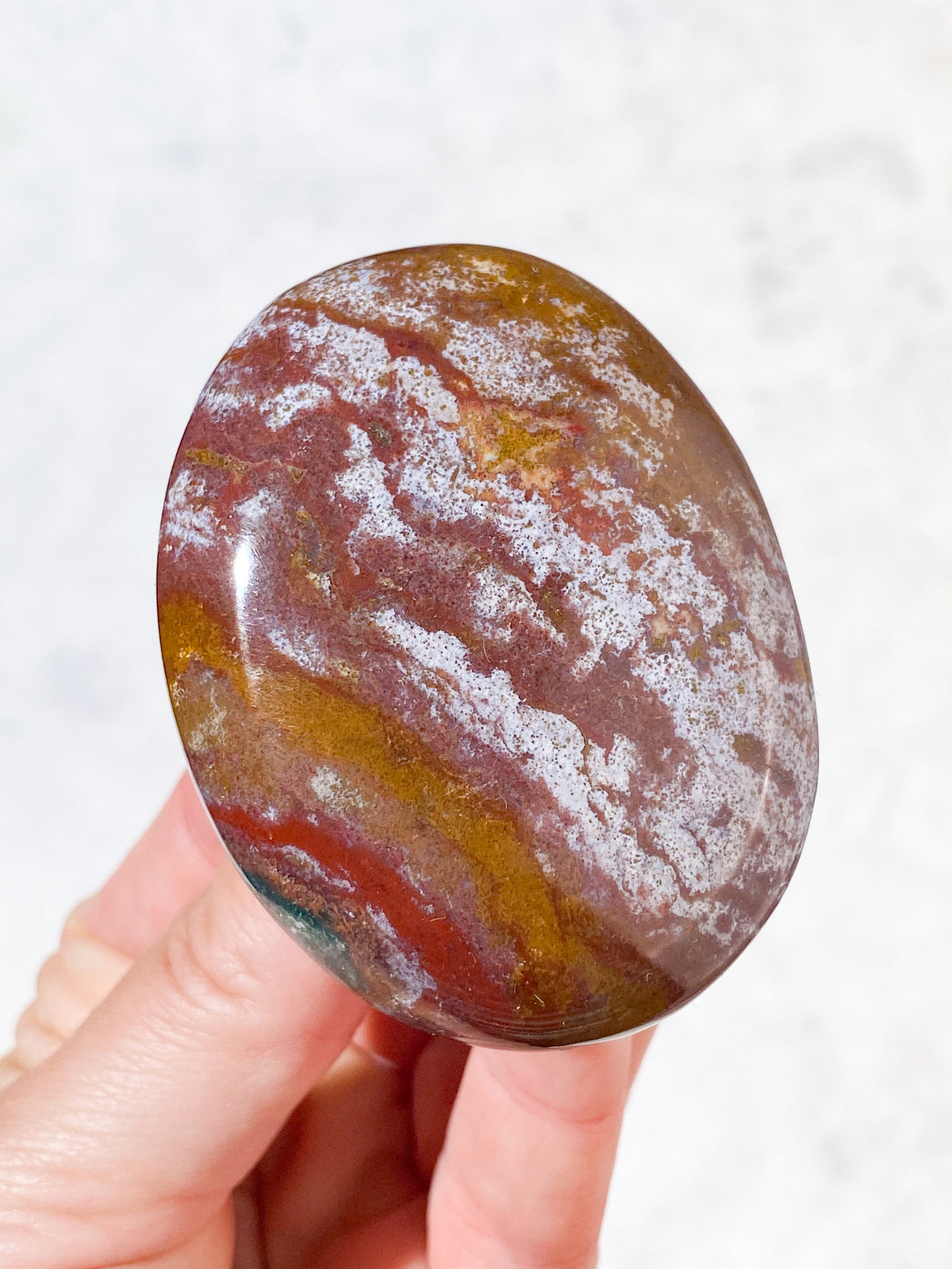 Röd Ocean Jaspis Palmstone (Nr 5)