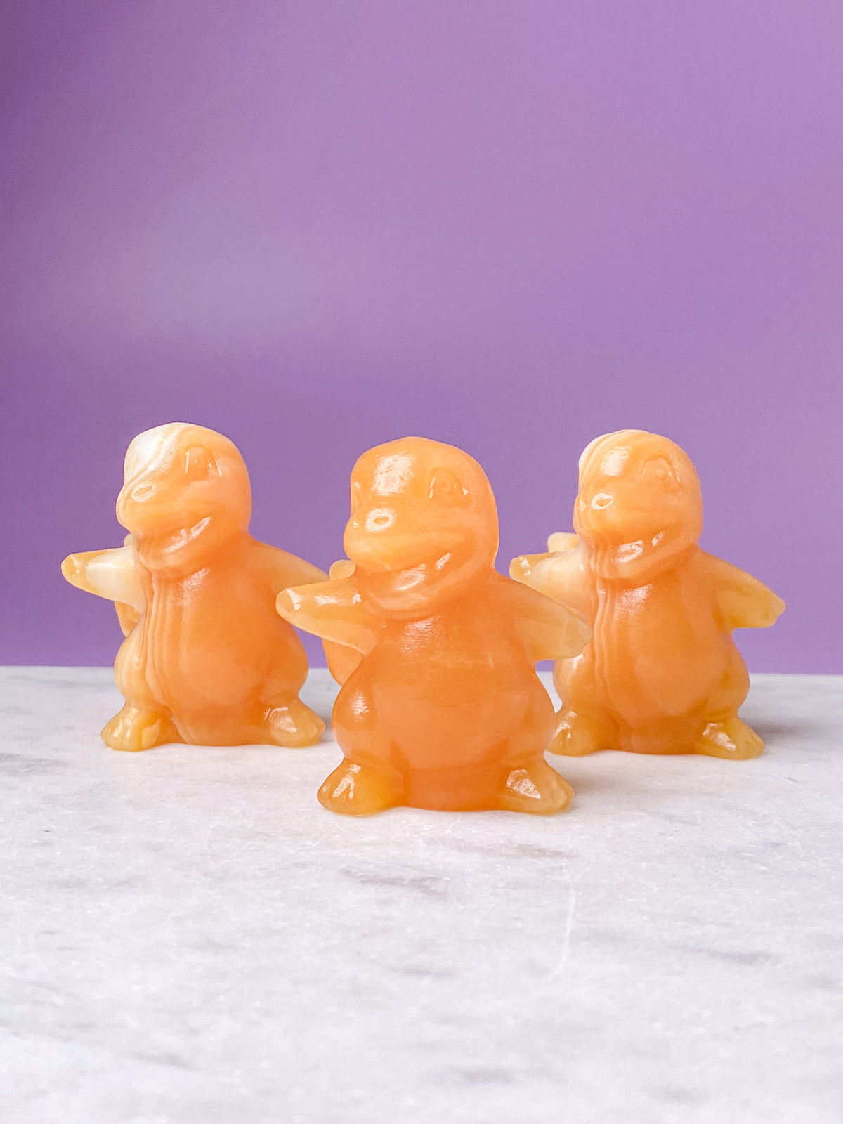 Orange kalcitpumpa med band